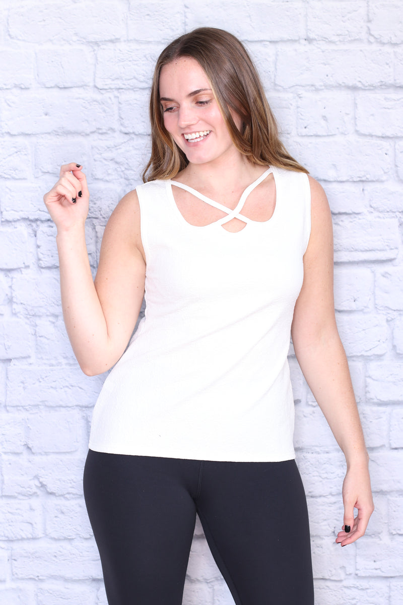 Criss cross tank top deals
